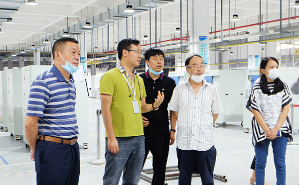 重庆市北碚区一行领导对今年会科技总部进行参观调研